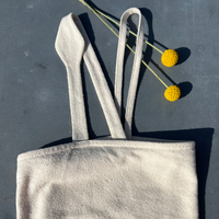 close up of raw off white jersey silk tank top by Malaika New York