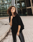 A women wearing Malaika New York look from head to toe. Comfortable loose fitted organic cotton black t-shirt by Malaika New York