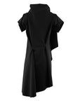 the back of a black shift dress with sleeves hold together with snaps by Malaika New York