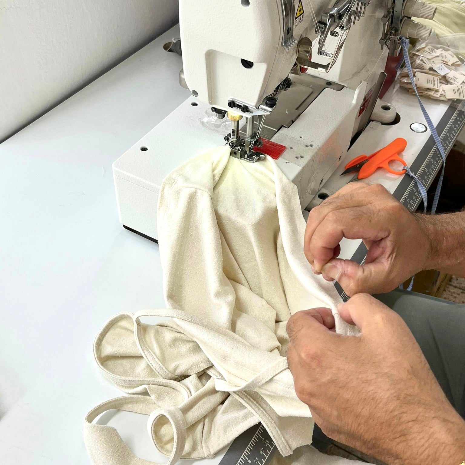 Factory working a raw jersey silk sleeveless top