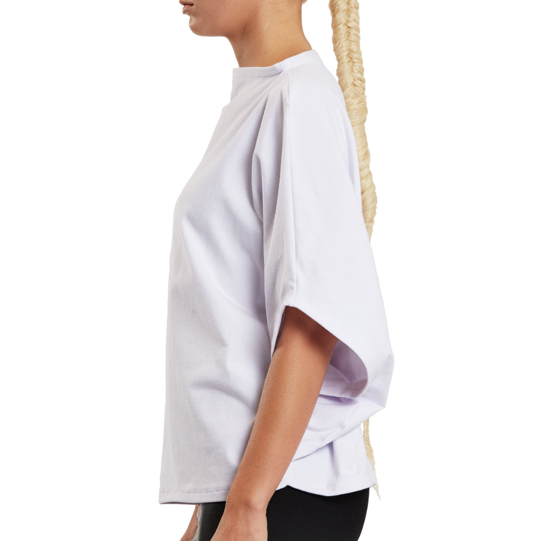 Side view of a loose fitted organic cotton t-shirt by Malaika New York