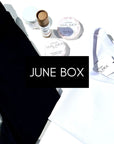 An example of our June mystery box filled with a organic cotton dress, a t-shirt & zero waste personal care products