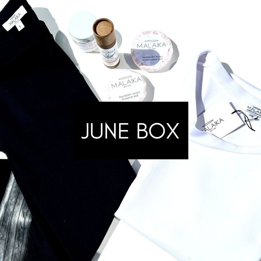 An example of our June mystery box filled with a organic cotton dress, a t-shirt & zero waste personal care products